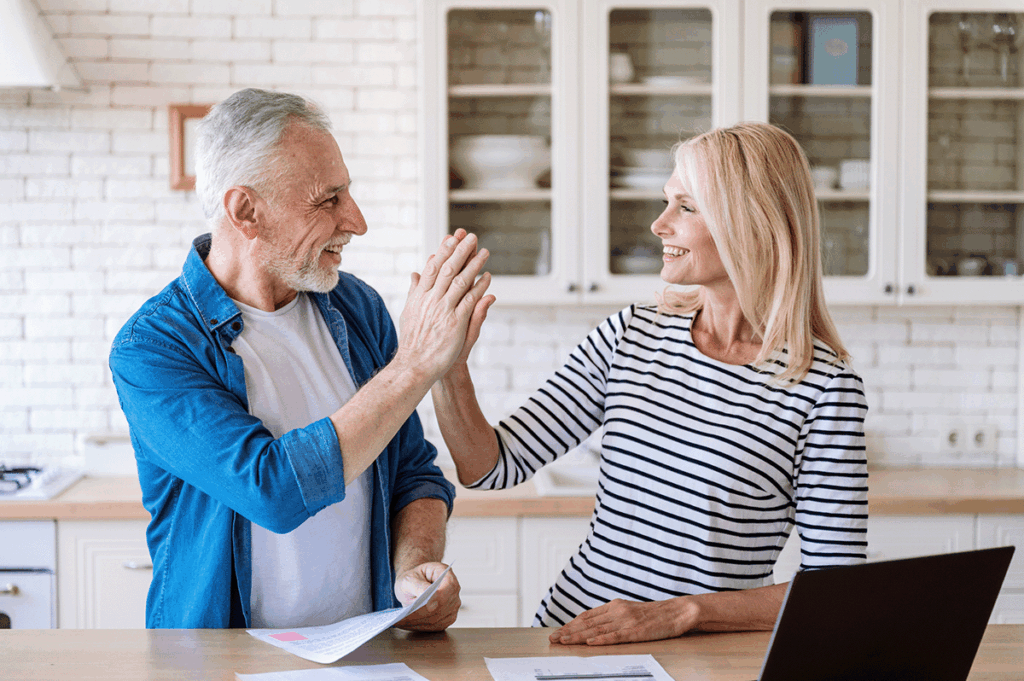 Happy Couple Doing Taxes