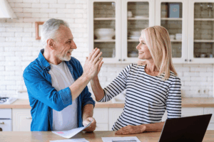 Happy Couple Doing Taxes